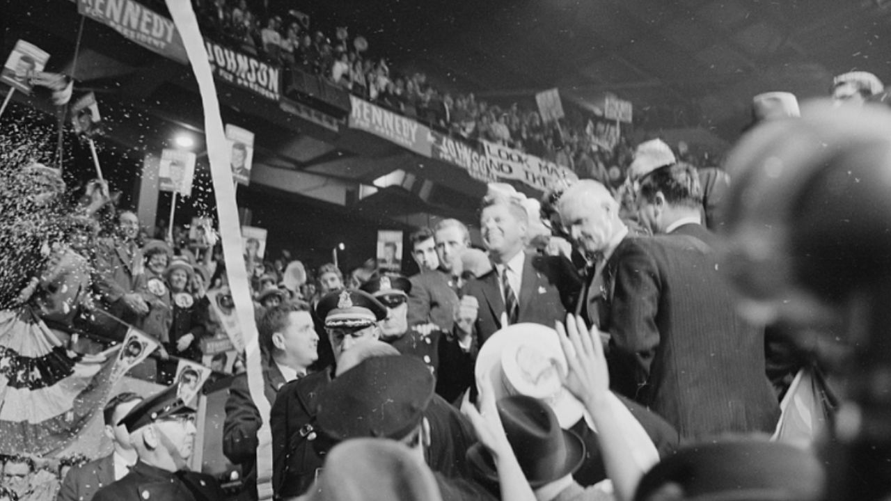John F. Kennedy (center) surrounded by supporters at the Boston Garden on the night before Election Day, c. November 7, 1960